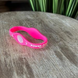Hot pink power balance bracelet. Like new.